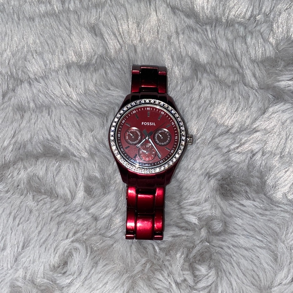 Fossil Watch with crystals face, red/burgundy band.